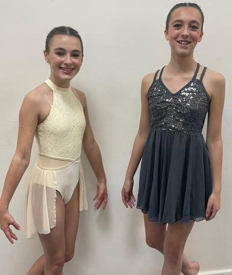 two girls in ballet uniform