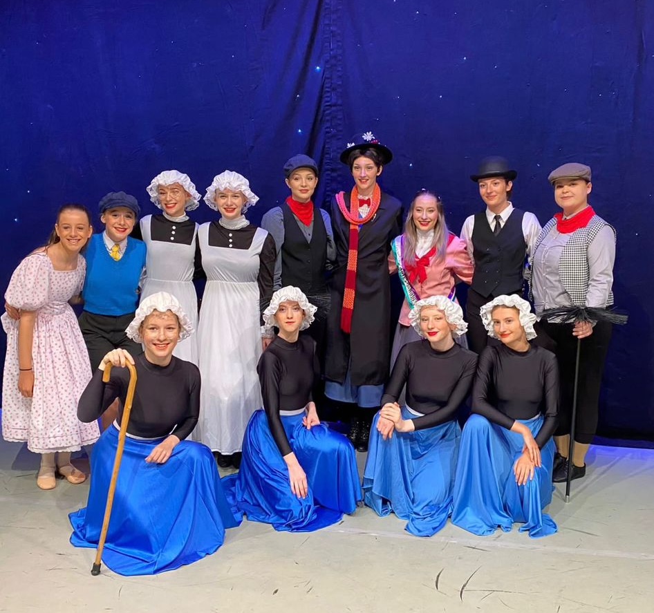 group of students dressed in mary poppins themed wear